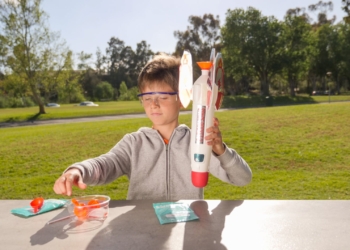 a boy playing a rocket