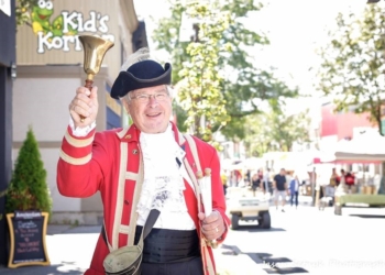 Stormont, Dundas, and Glengarry Historical Society President Wes Libbey dressed as a Town Crier