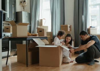 family unpacking after moving