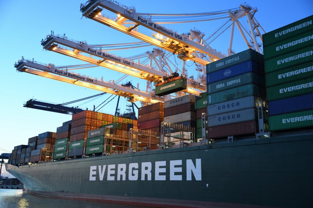 green and gray evergreen cargo ship