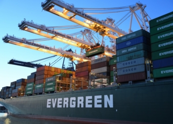 green and gray evergreen cargo ship