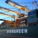 green and gray evergreen cargo ship