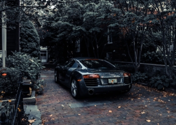 photo of audi parked near trees