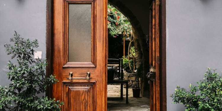 Opened Brown Wooden French Door