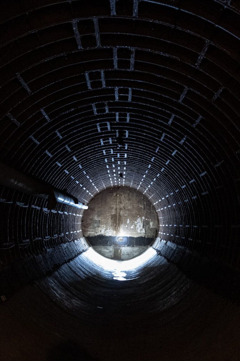 a dark tunnel with a light at the end