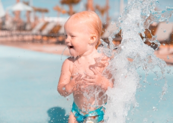 girl standing on pool