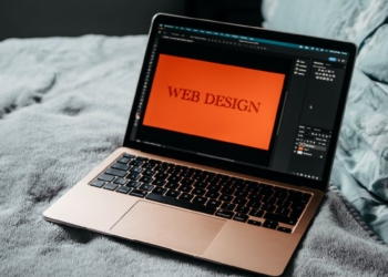 Open Laptop Web Design Development on Bed