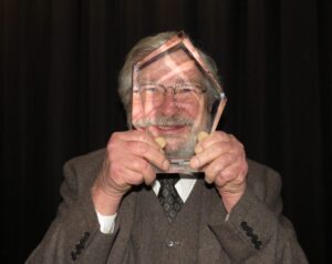 wes goofing with award