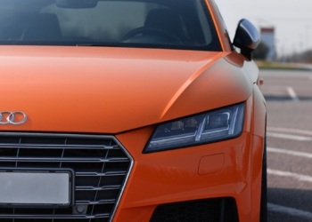 orange Audi vehicle