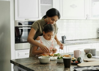Mother and Daughter Preparing Avocado Toast