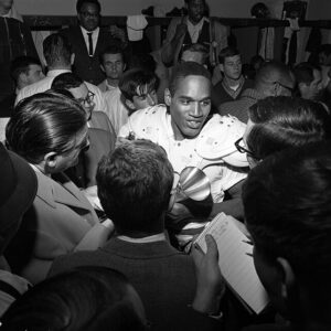O.J._Simpson_talking_to_reporters,_1967