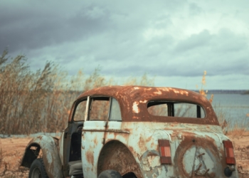vintage car on brown field during daytime