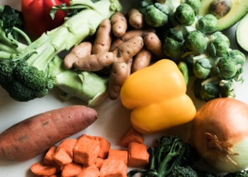 sliced carrots and green vegetable