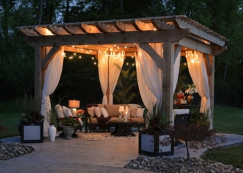 photo of gazebo with curtain and string lights