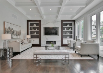 white wooden coffee table near white sofa