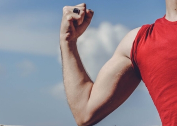 Man Raising His Right Arm