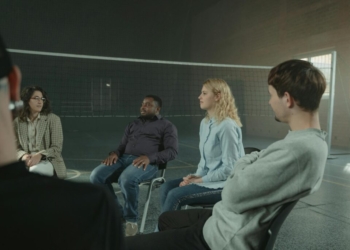 People Attending a Group Therapy Meeting