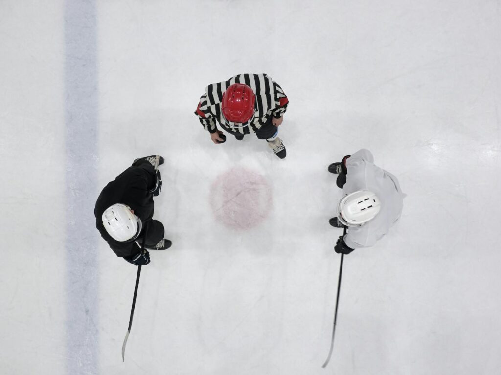 Top View of Men Playing Ice Hockey