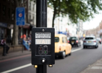 pedestrian signage displaying wait
