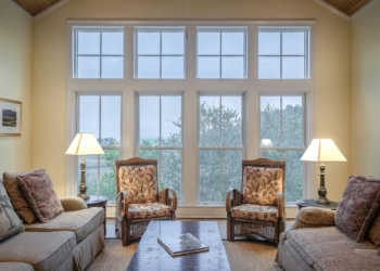 Brown Wooden Coffee Table With Couches and Chairs