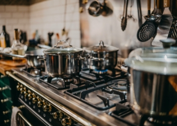 stainless steel cooking pots on gas stove