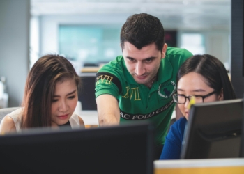 two women and one man on computer screen