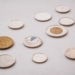 a bunch of different types of coins on a table