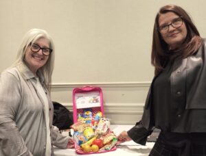 Lisa and Brenda with the backpack