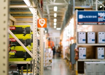 a store aisle filled with lots of yellow and red items