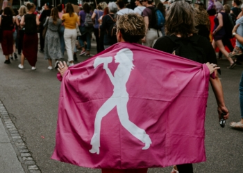 people gathering near road during daytime