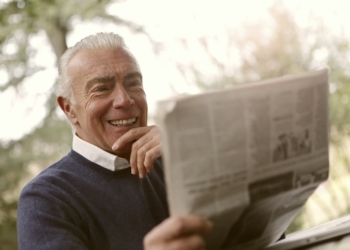 man reading newspaper