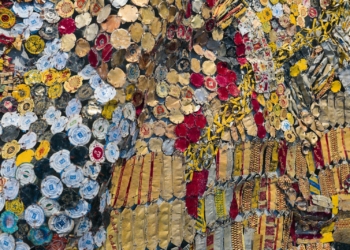 a wall covered in lots of different types of buttons