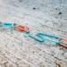 blue green and red plastic clothes pin