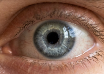 persons eye in close up photography