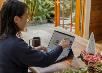 a woman using a laptop