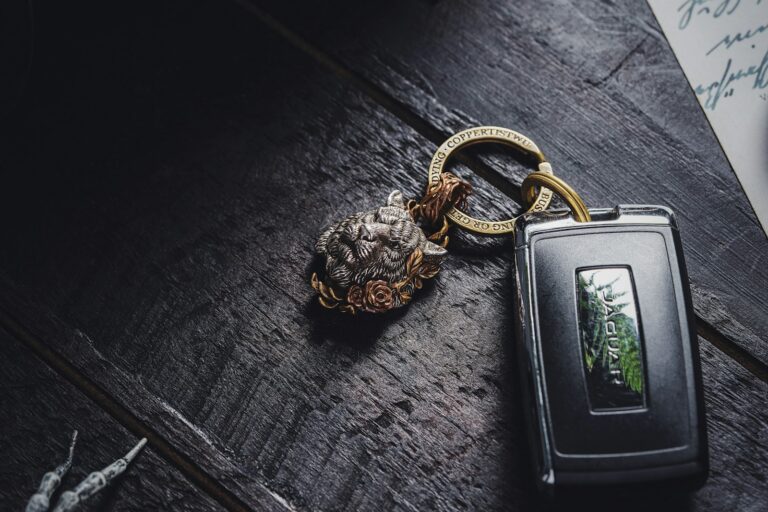 a keychain with a picture of a pine tree on it