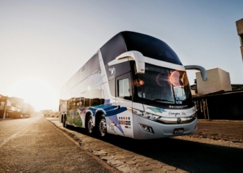 gray and black bus parked during daytime