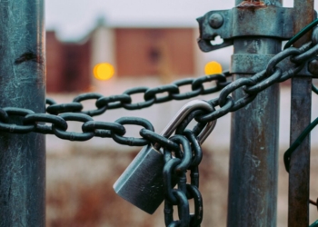 macro shot of stainless steel padlock