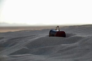 a person on a device in the desert