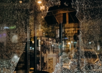 people standing on street during night time