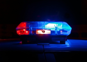 blue bmw car in a dark room