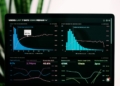 graphs of performance analytics on a laptop screen