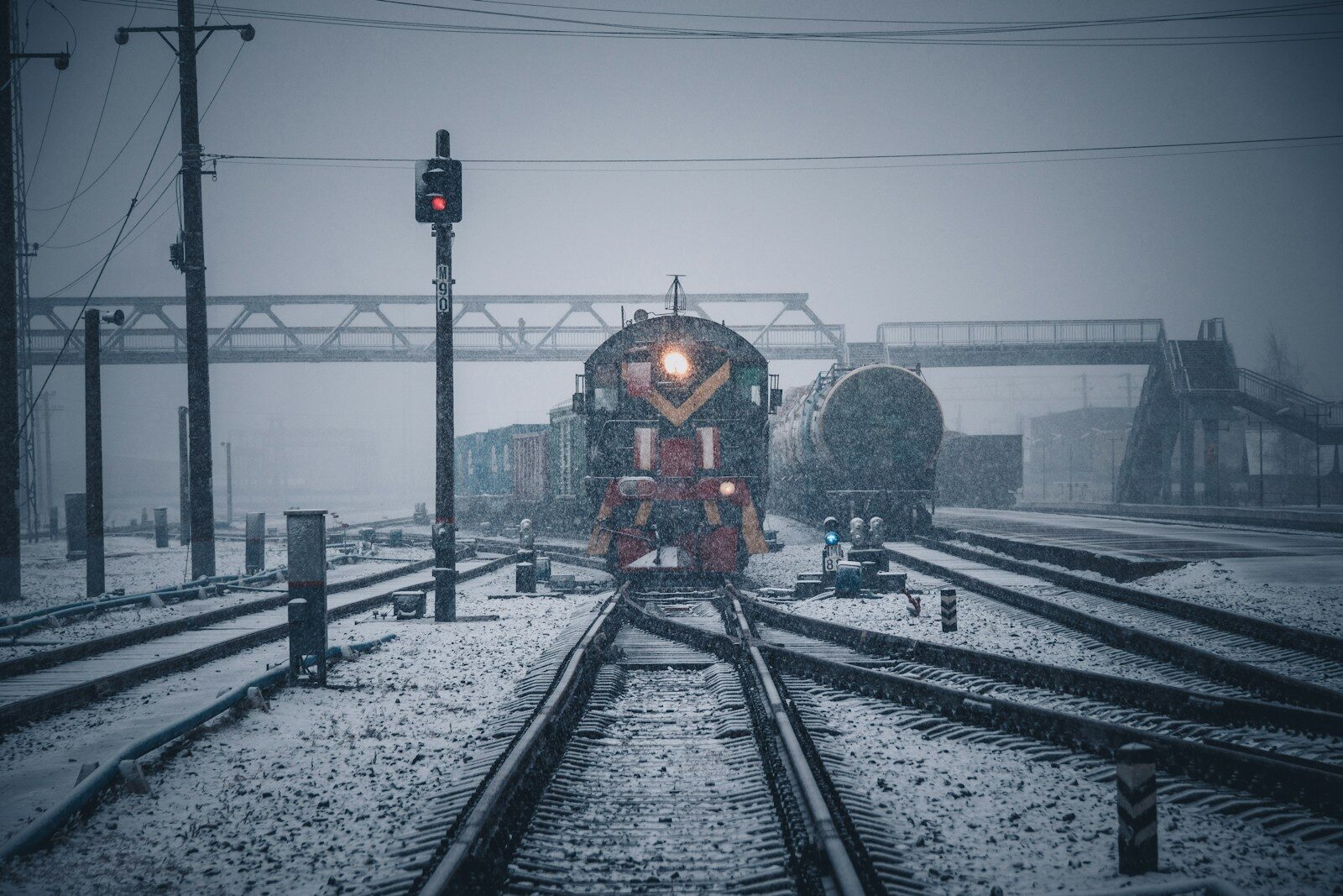 train on rail tracks during daytime
