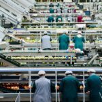 a group of men in a factory