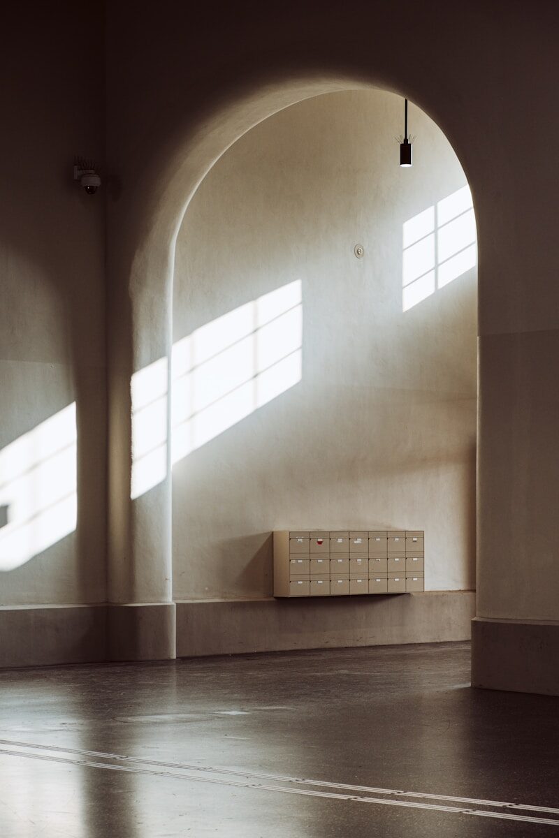 Sunlight streams through windows onto lockers