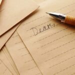 a pen sitting on top of a piece of paper