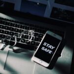 white iphone 4 on white table