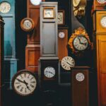 brown wooden framed analog clock