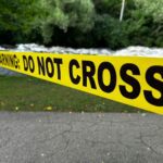 Yellow caution tape with "do not cross" text