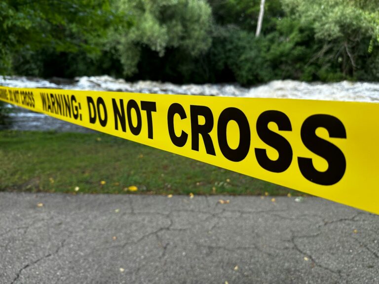 Yellow caution tape with "do not cross" text